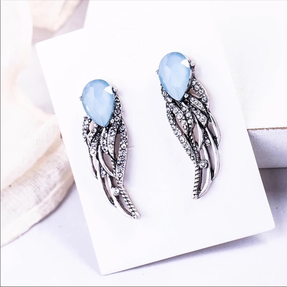 New Hollowed Out Crystal Wing Stud Earrings - Picture 2 of 4